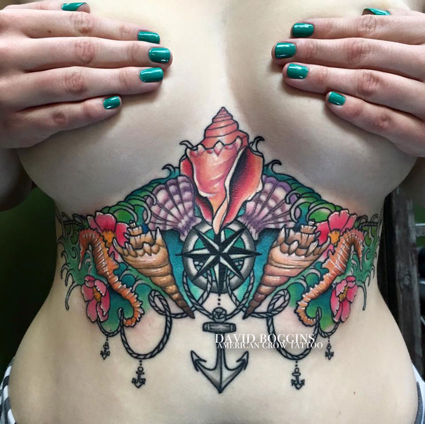 Showing tattoo on boob