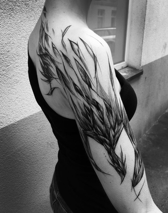 Phoenix On Woman's Arm | Best tattoo design ideas