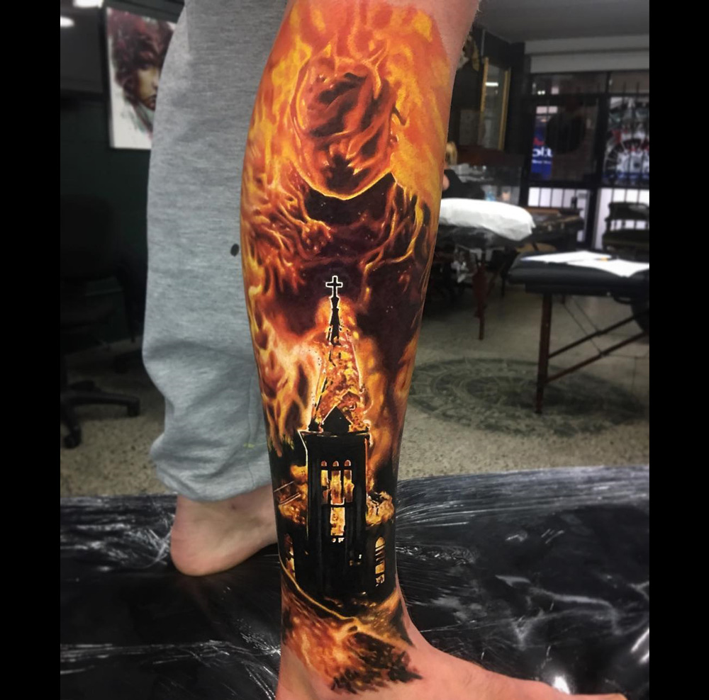 Burning-Church-mens-leg-tattoo.jpg