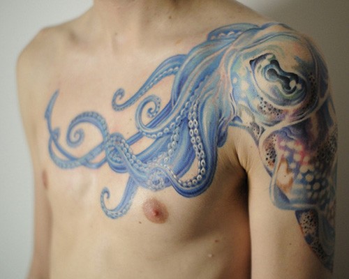 men shoulder and chest tattoo