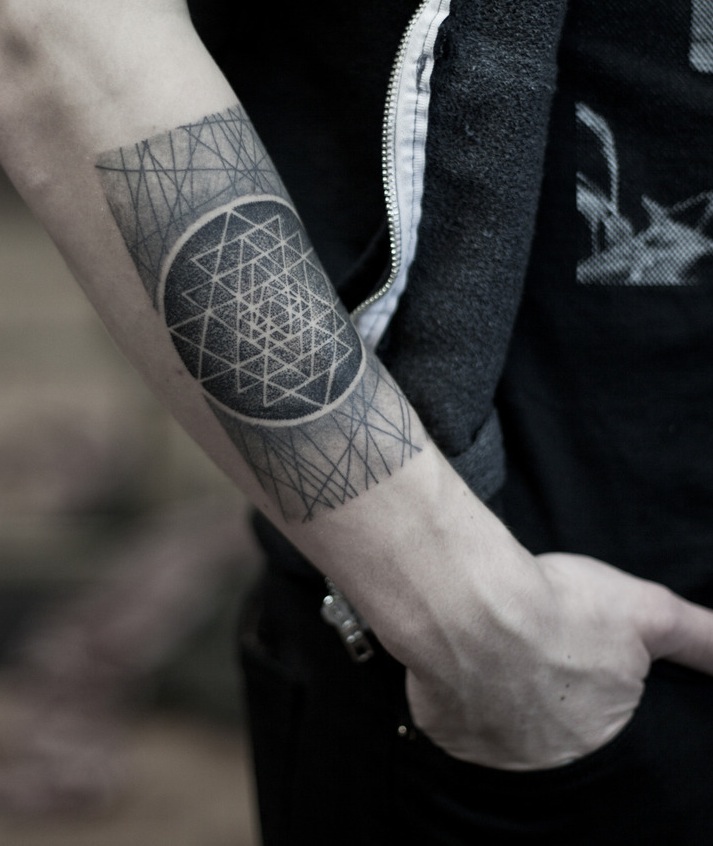 Conceptual arm tattoo