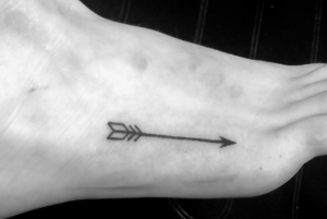 Simple arrow tattoo