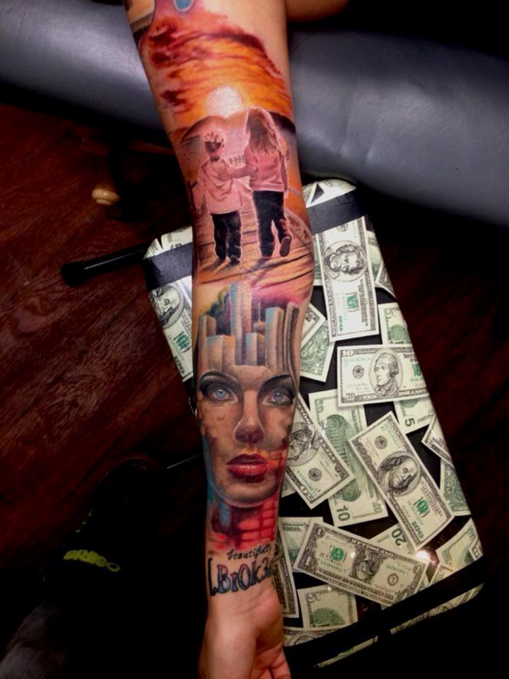 Amazing colourful arm tattoo