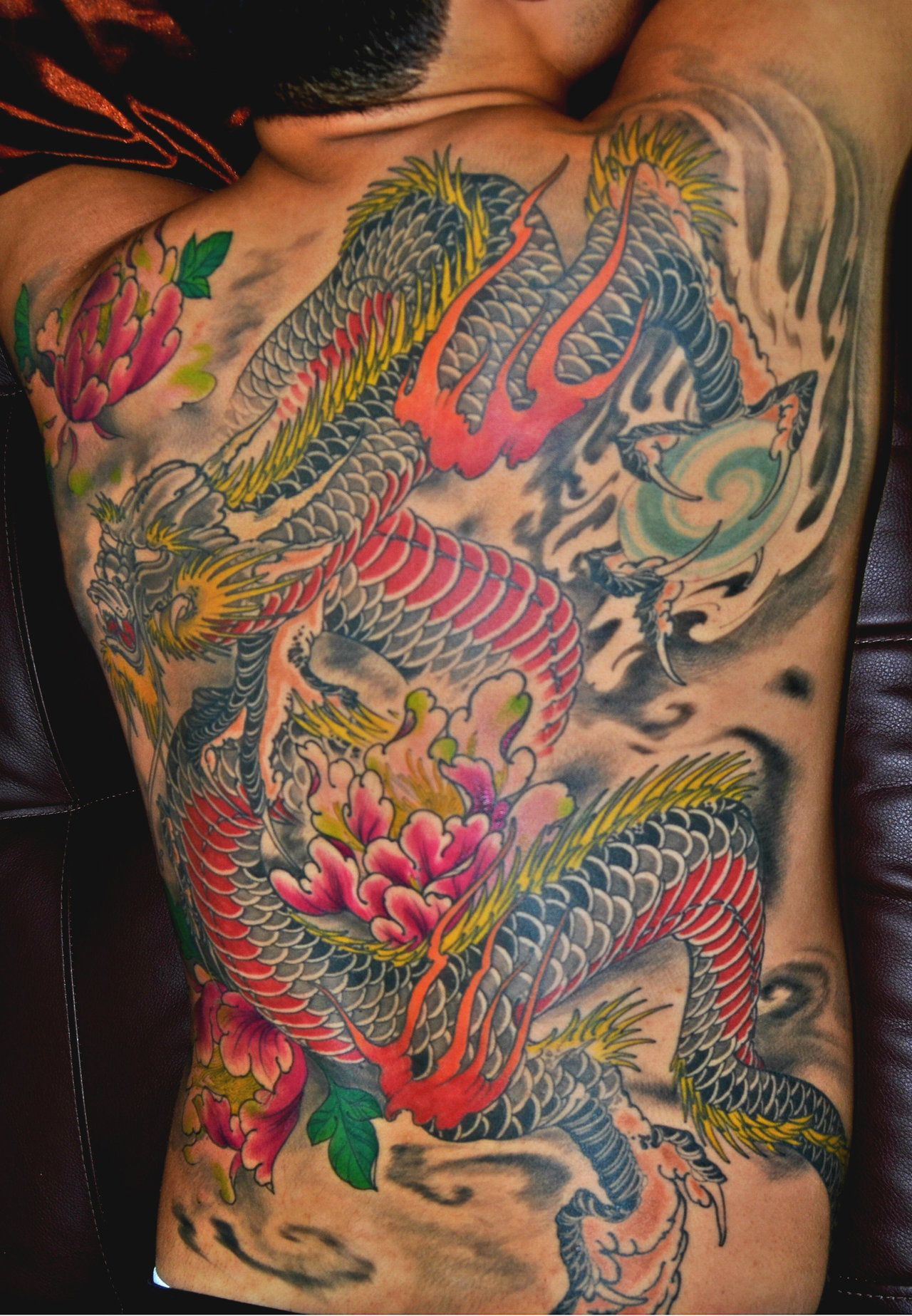 Woman with Chinese Dragon Tattoo Stock Photo - Alamy
