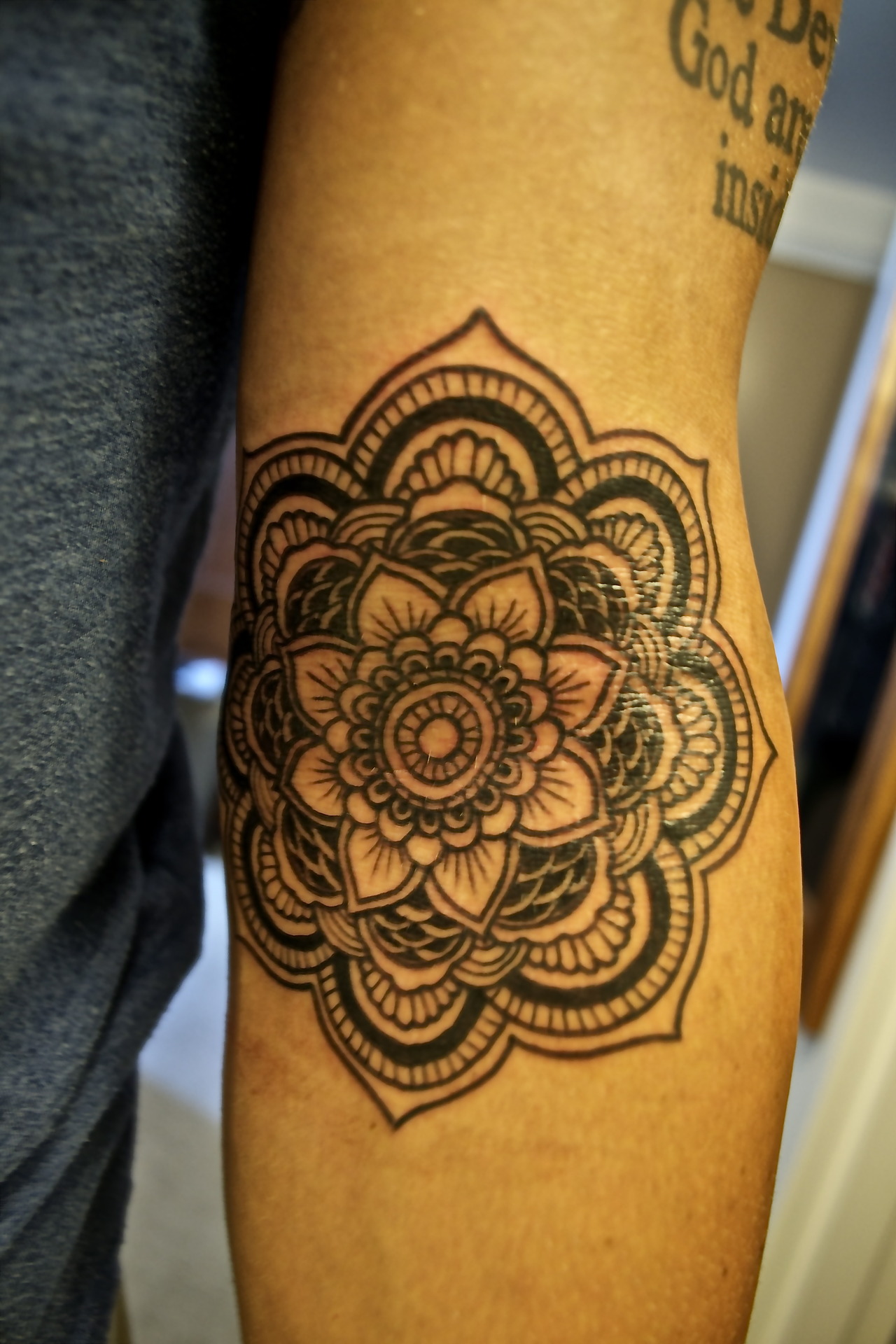 Awesome flower tattoo on arm