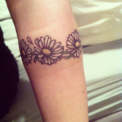 Cute daisy tattoo