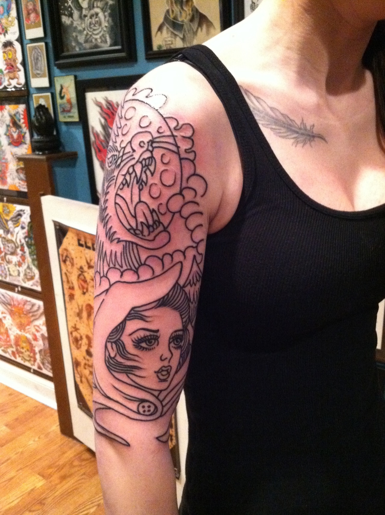 Girl's sleeve tattoo