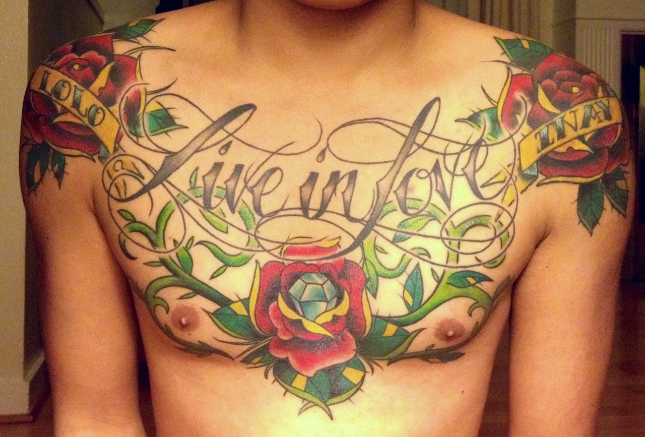 Live in love chest tattoo.