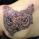 Nice girl's back tattoo