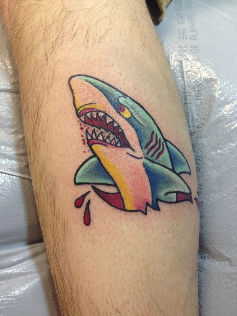 Shark leg tattoo