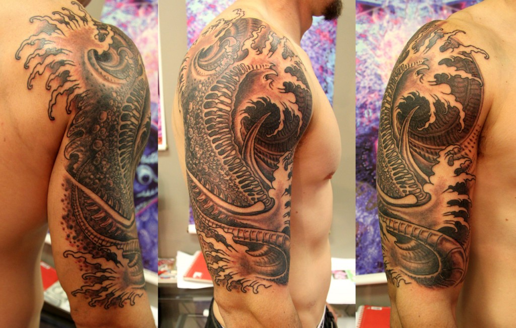 Sleeve and shoulder tattoo