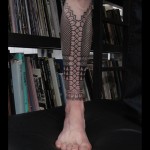 Black pattern leg tat