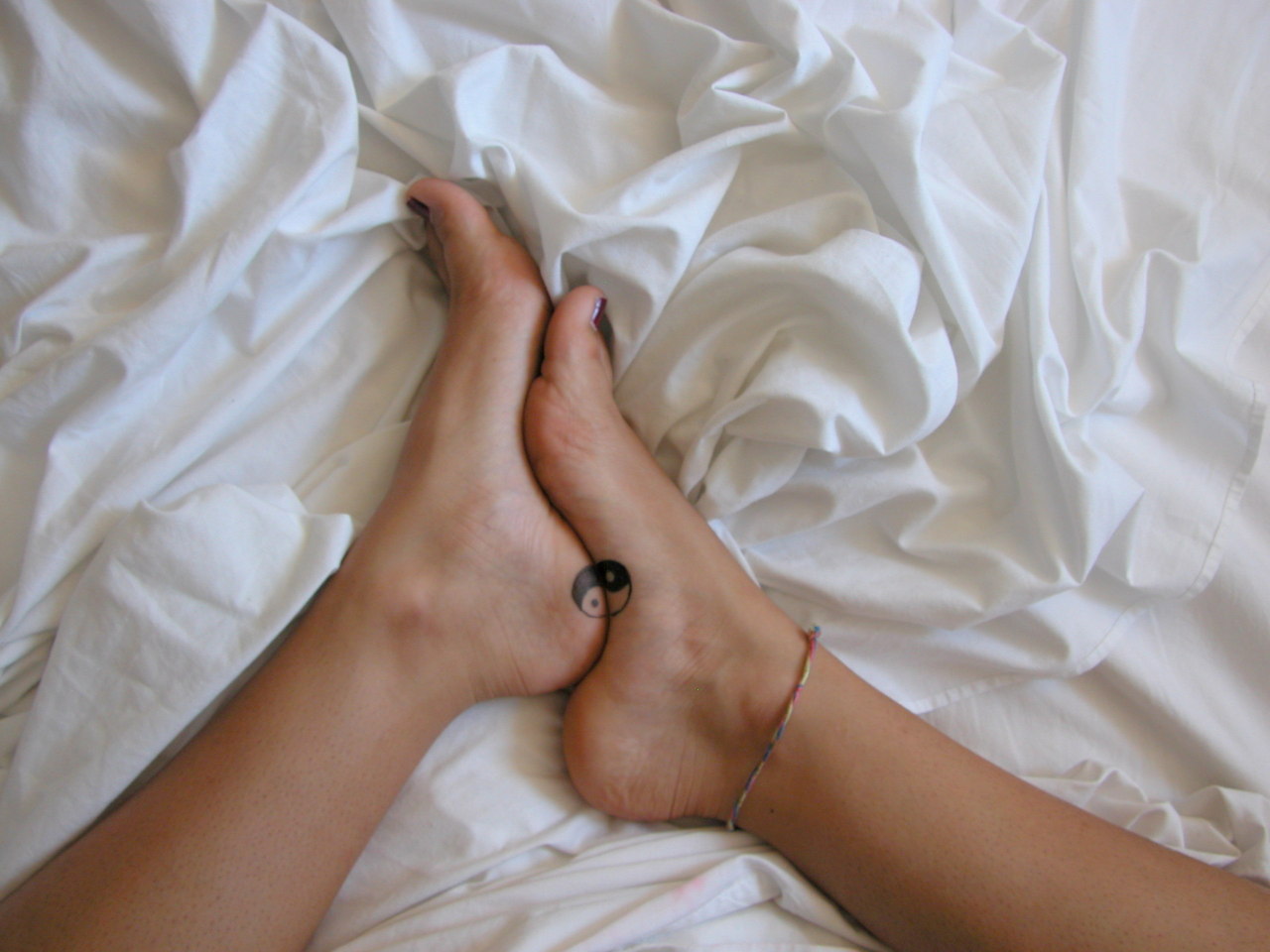 Cute feet tattoo yin & yan