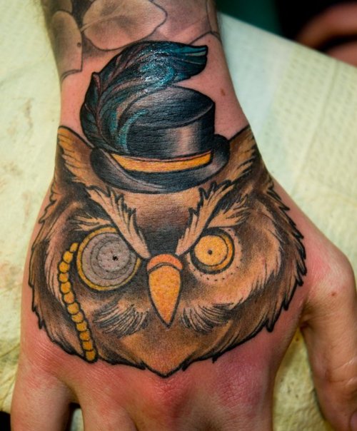 Funny owl tattoo