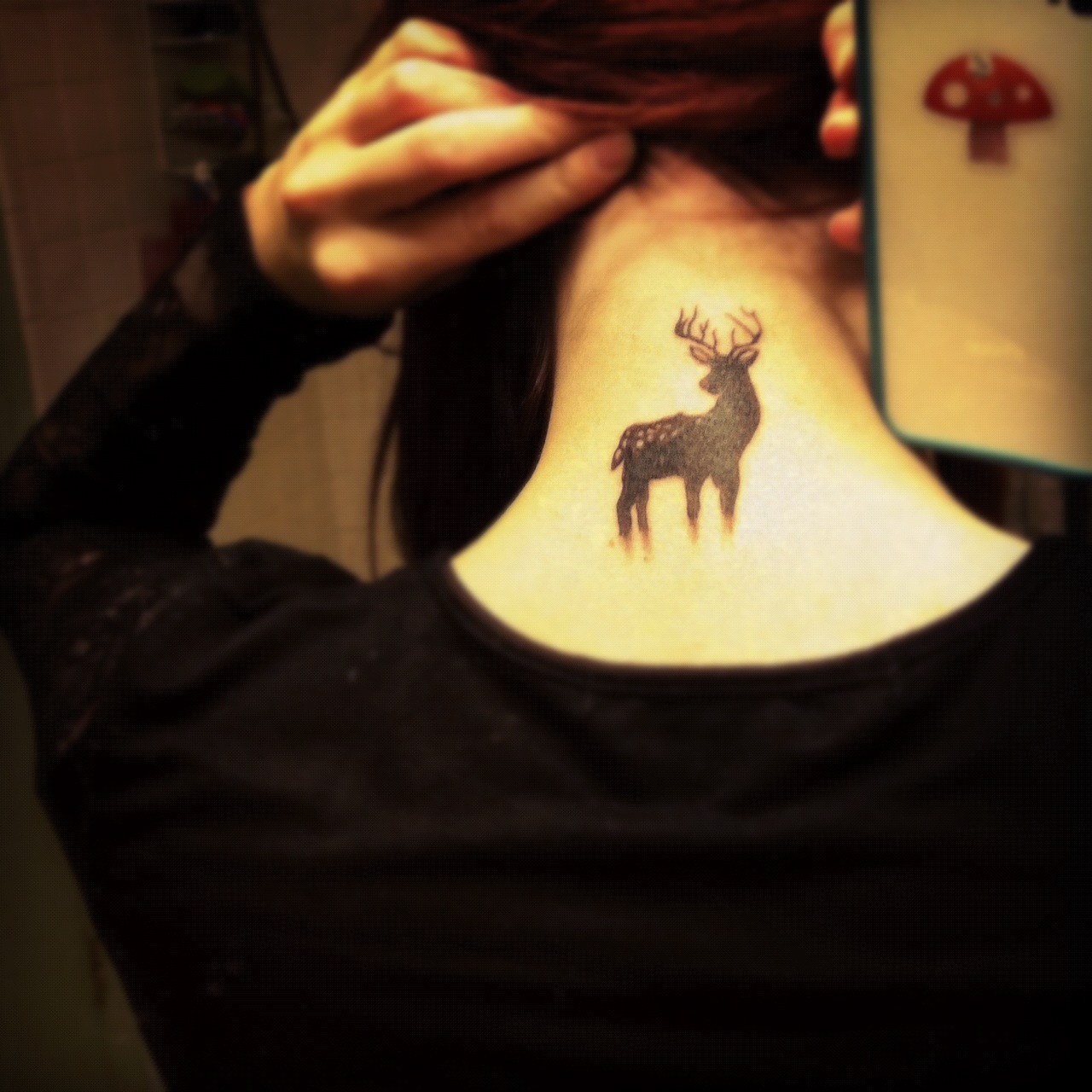 Black Deer Neck Tattoo