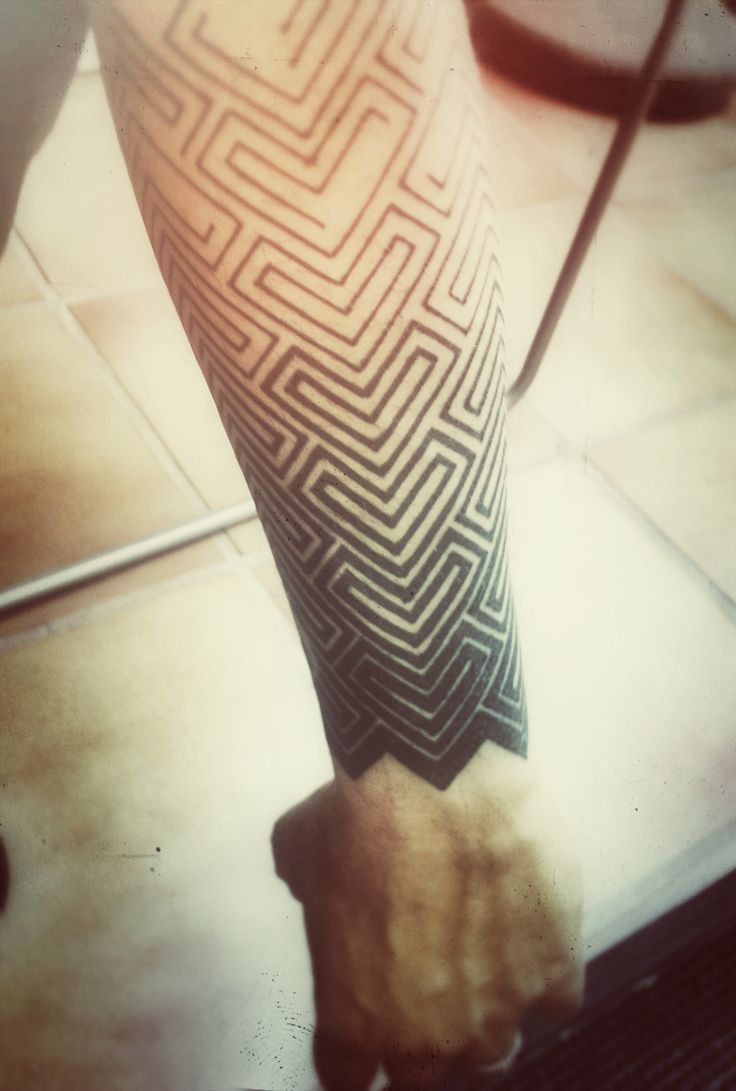 geometric arm tattoo