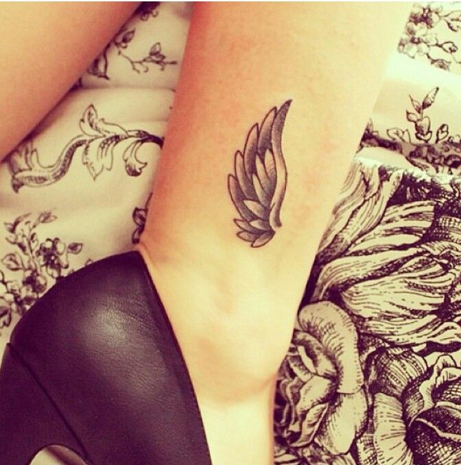 Simple Wing Tattoo