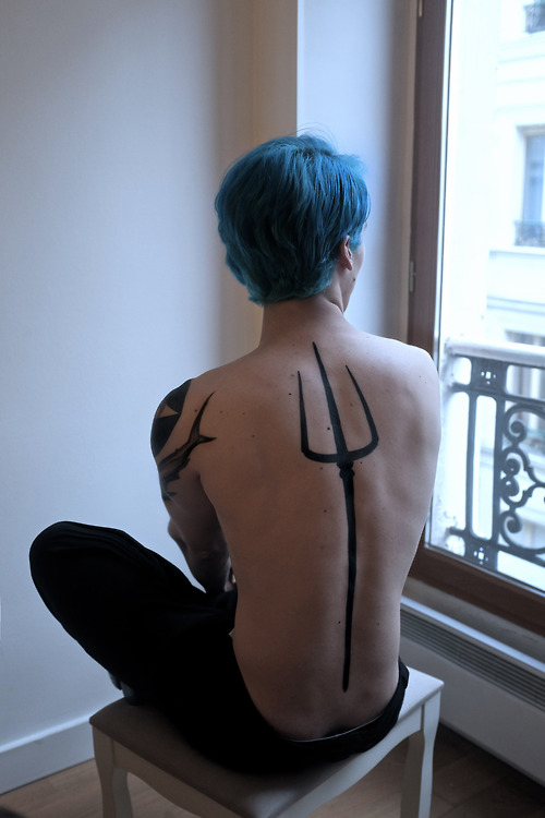 Trident Tattoo On Back
