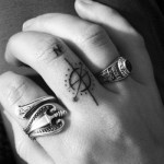 Minimal Compass Finger Tattoo
