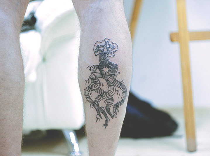 Roots Tattoo On Leg