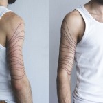 Waterlines Arm Tattoo