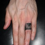 Minimal Black Tat On Finger