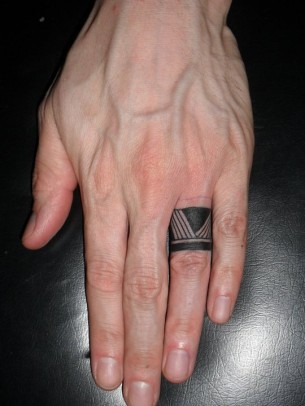 Minimal Black Tat On Finger