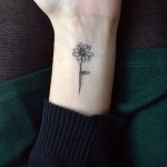 Small Flower Tattoo On Wrist