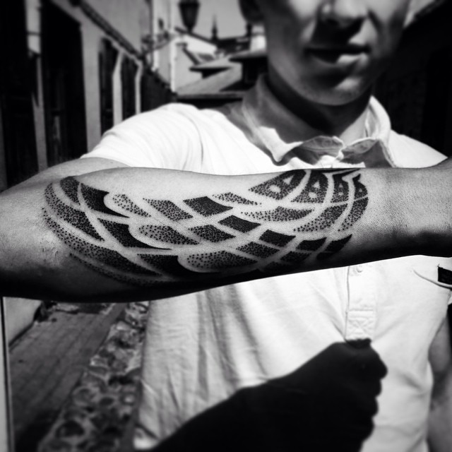 Dot Work Wing Tattoo On Arm