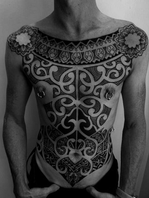 Amazing Tribal Chest Tattoo Design