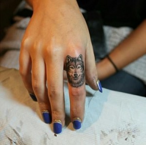 Small Wolf Tattoo On Finger