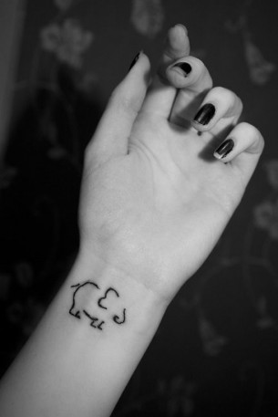 Elephant Outline Wrist Tattoo