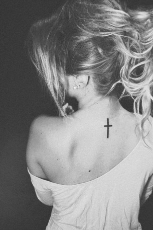 Small Cross on Back Tattoo