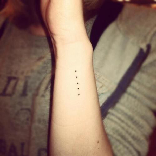 Simple Dots in a Row Tattoo