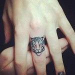 Tiger Finger Tattoo