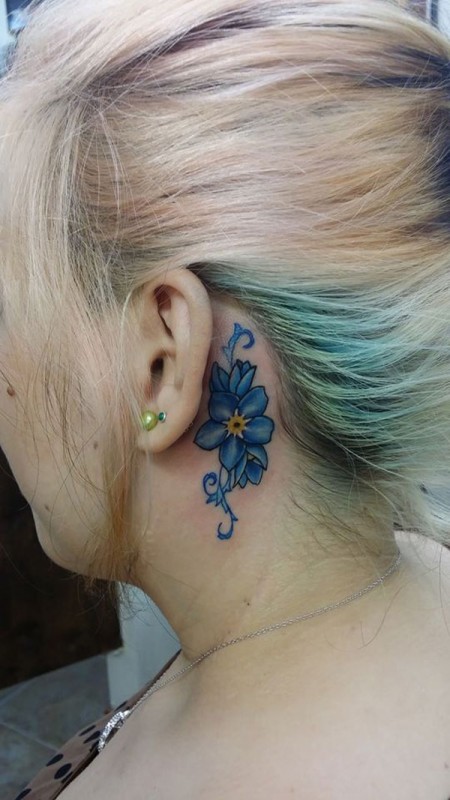 Blue Flower Behind the Ear Tattoo