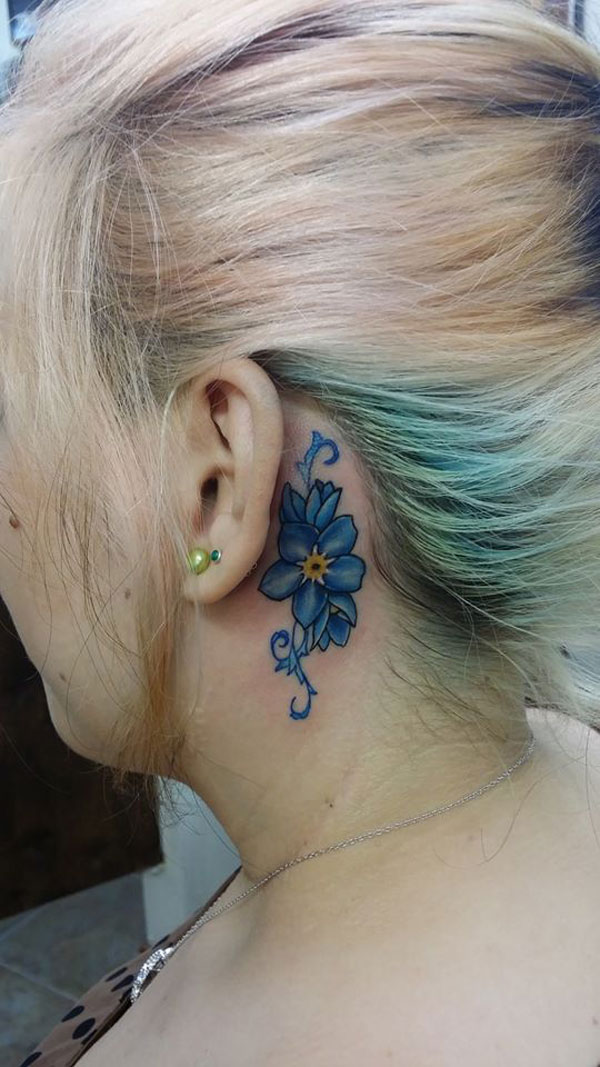 30 Beautiful Flower Tattoo Ideas  Colourful Tiny Flower Tattoo on Ear I  Take You  Wedding Readings  Wedding Ideas  Wedding Dresses  Wedding  Theme