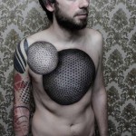Chest Spheres Tattoo