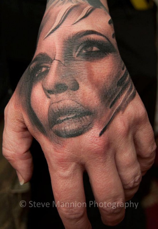 Girls Face Hand Tattoo