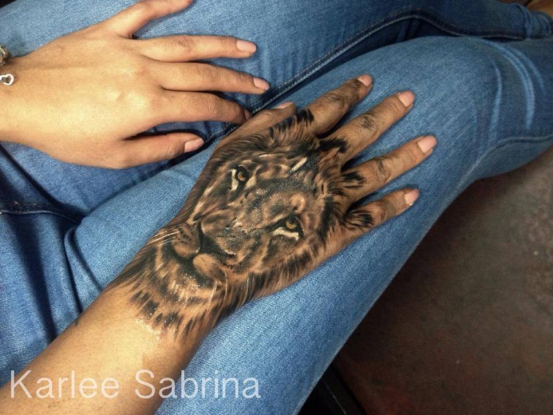 Beautiful Lion Hand Tattoo