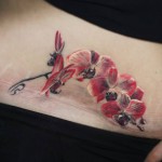 Orchid Belly Tattoo