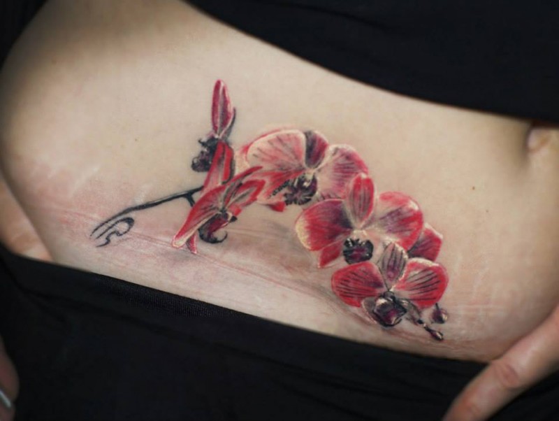 Orchid Belly Tattoo