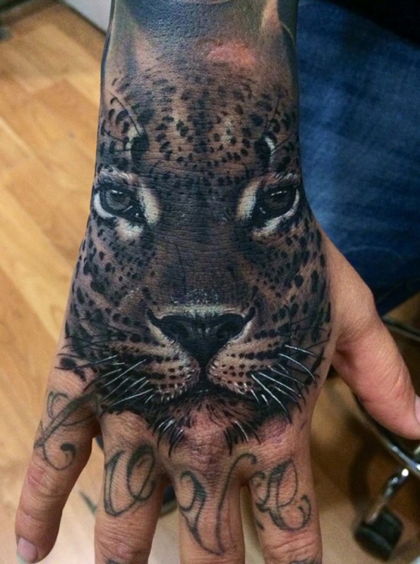 Leopard Hand Tattoo