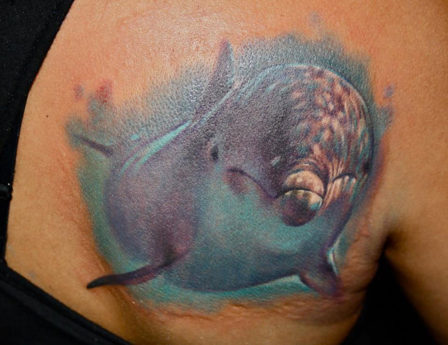 Dolphin Back Tattoo