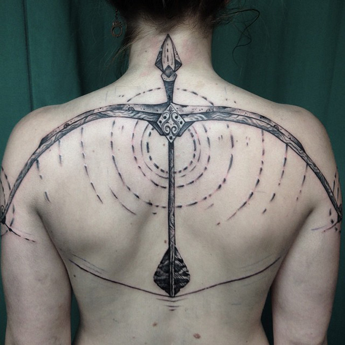 Bow and Arrow Back Tattoo