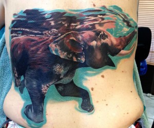 Swimming Elephant Back Tattoo