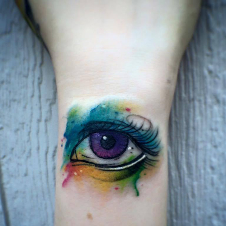 Watercolor eye tattoo