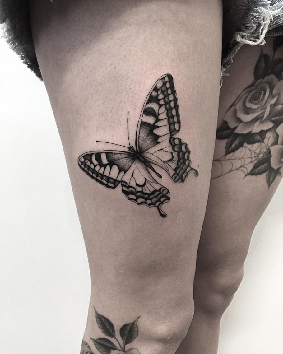 Black Ink Butterfly on Girls Thigh