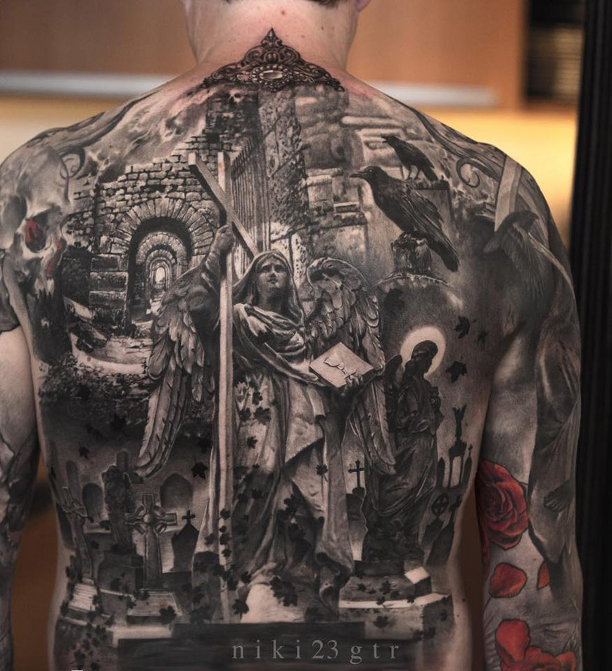 Religious Piece On Guys Back Best tattoo design ideas