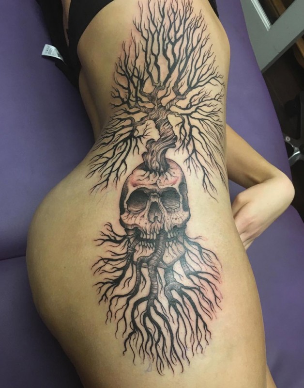 Growing tree & skull tattoo